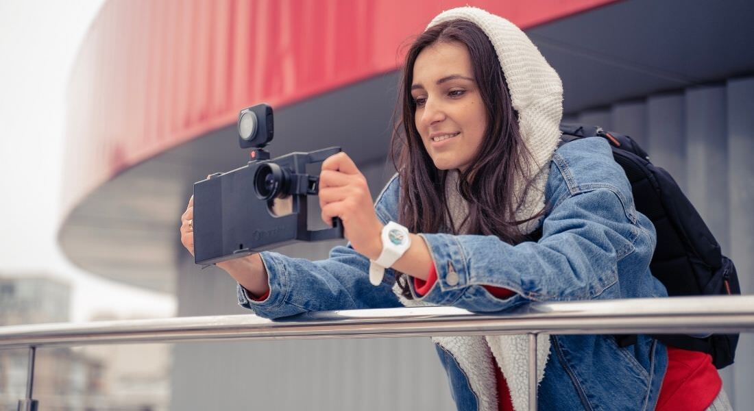 Woman holding iOgrapher case