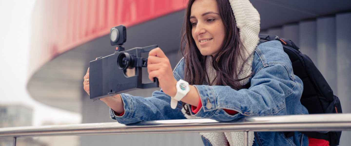 Woman holding iOgrapher phone case