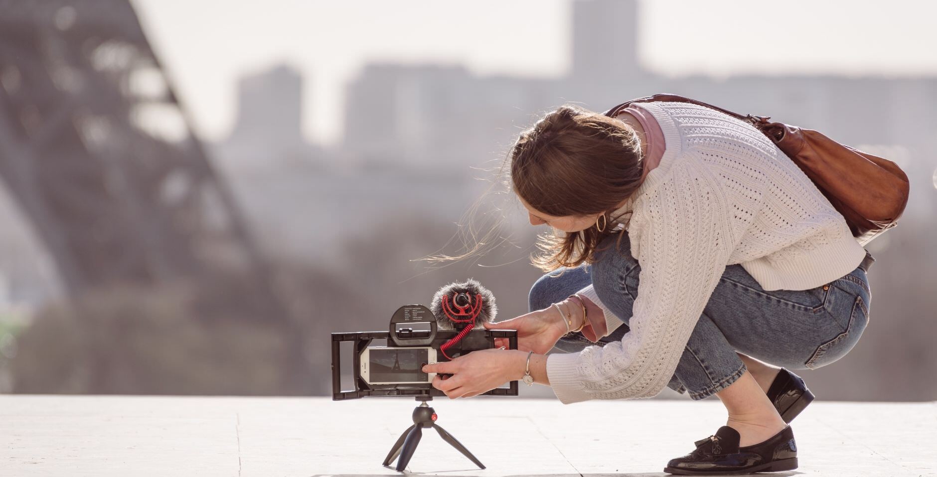 Woman with iOgrapher case and tripod